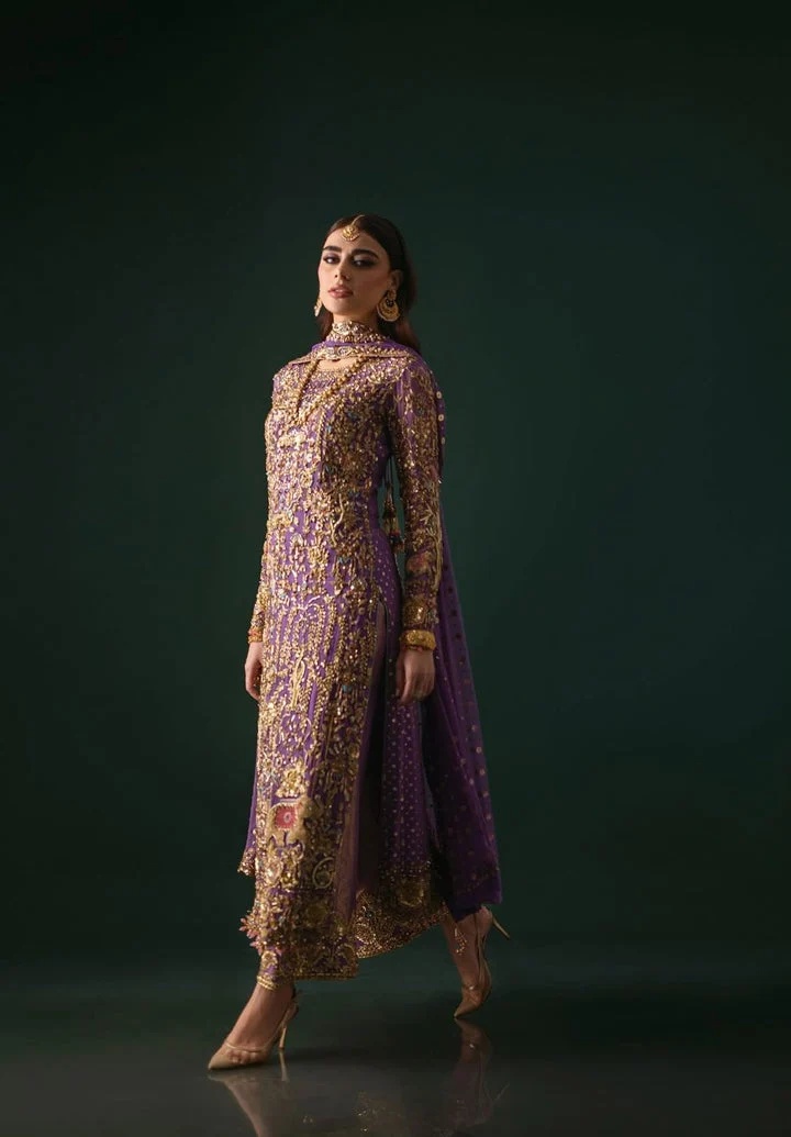 Nomi Ansari Couture pakistani fashion outfit in purple tones.